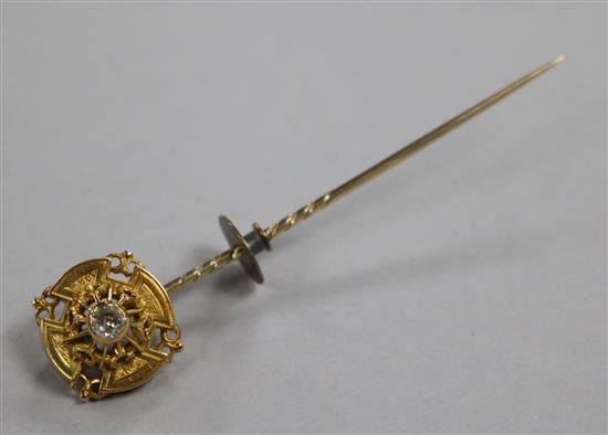 A Victorian yellow metal and solitaire diamond sick pin, 73mm.